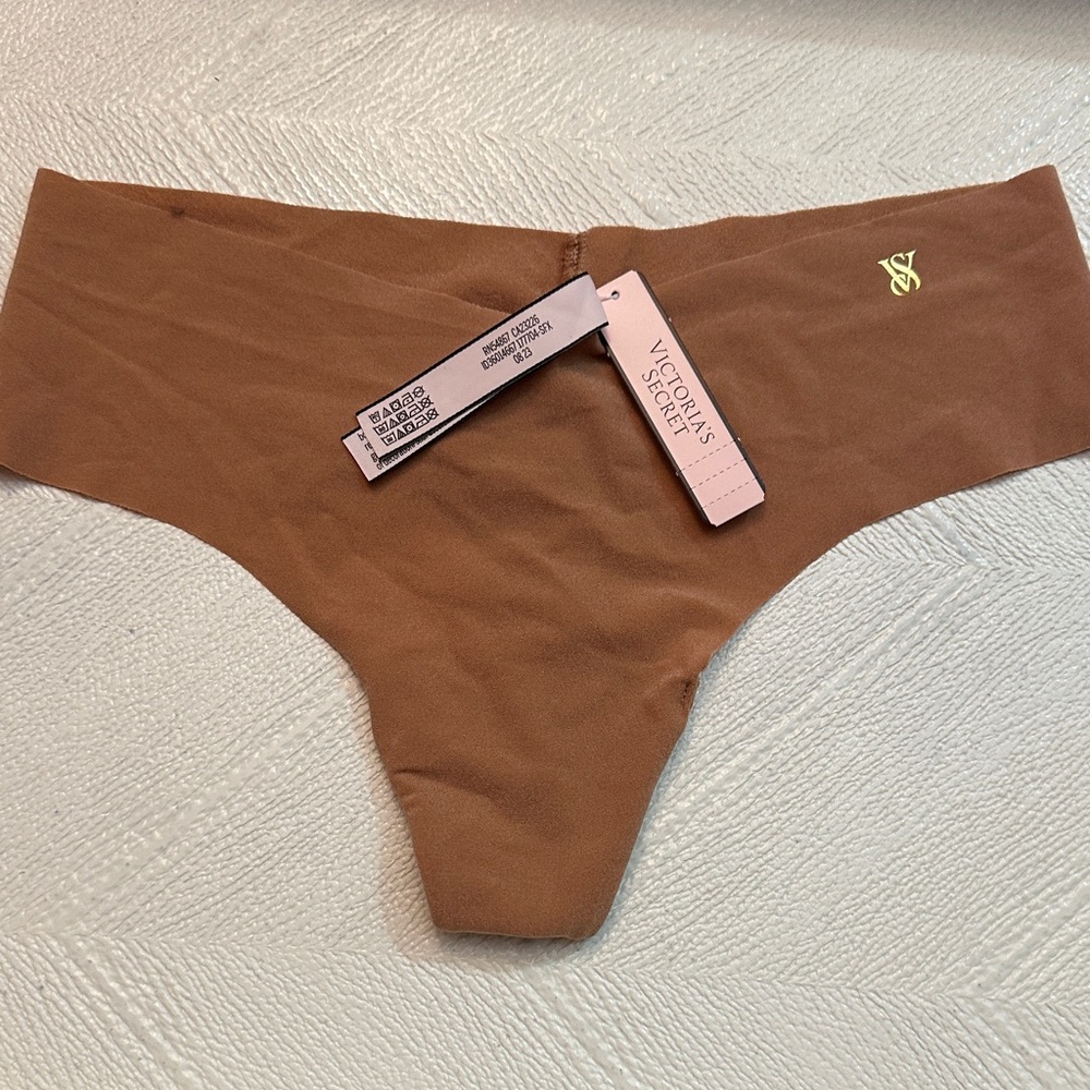 Five pieces,Victoria's Secret Brown Kids Bottoms, five pieces.